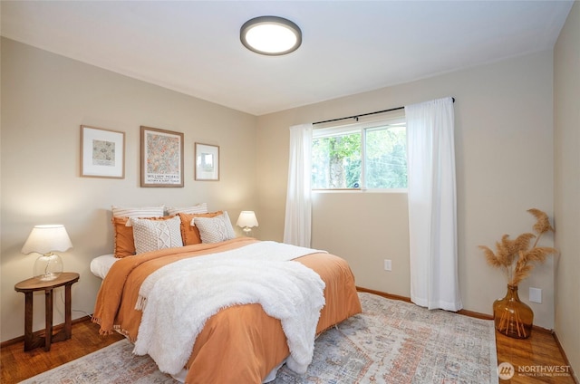 8618 94th St SW, Lakewood, WA 98498 - bedroom with light wood-type flooring and baseboards