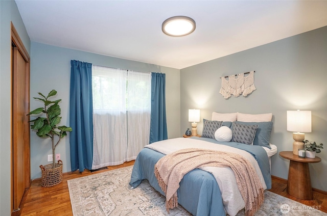 8618 94th St SW, Lakewood, WA 98498 - bedroom featuring wood finished floors and a closet