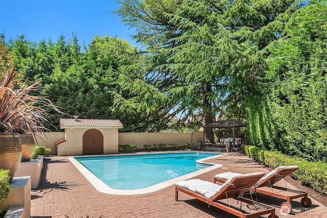 3103 Mount Rainier Dr S, Seattle, WA 98144 - view of swimming pool with a gazebo, a patio, a shed, and a fenced backyard
