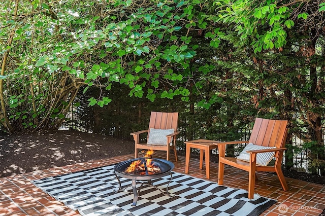 3103 Mount Rainier Dr S, Seattle, WA 98144 - view of patio with an outdoor fire pit