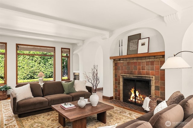 3103 Mount Rainier Dr S, Seattle, WA 98144 - living area with a tile fireplace, plenty of natural light, and wood finished floors