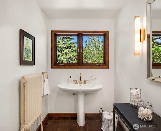 3103 Mount Rainier Dr S, Seattle, WA 98144 - bathroom with radiator heating unit and baseboards