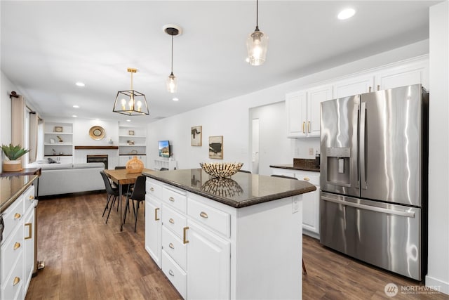 9220 NE 195th St, Bothell, WA 98011 - kitchen featuring stainless steel fridge, a center island, white cabinets, pendant lighting, and recessed lighting