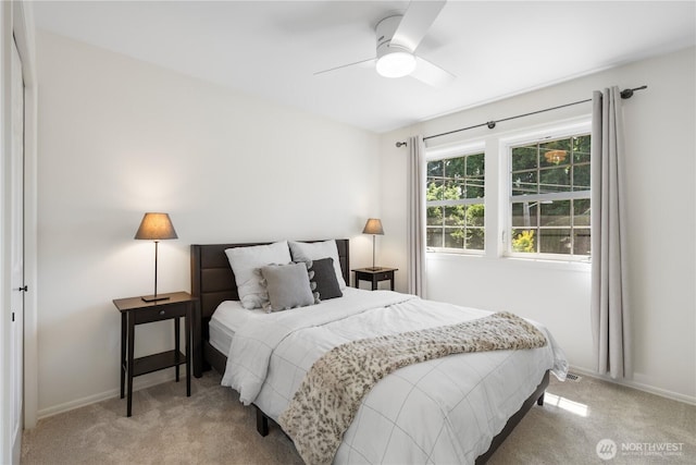 9220 NE 195th St, Bothell, WA 98011 - bedroom featuring light colored carpet and ceiling fan