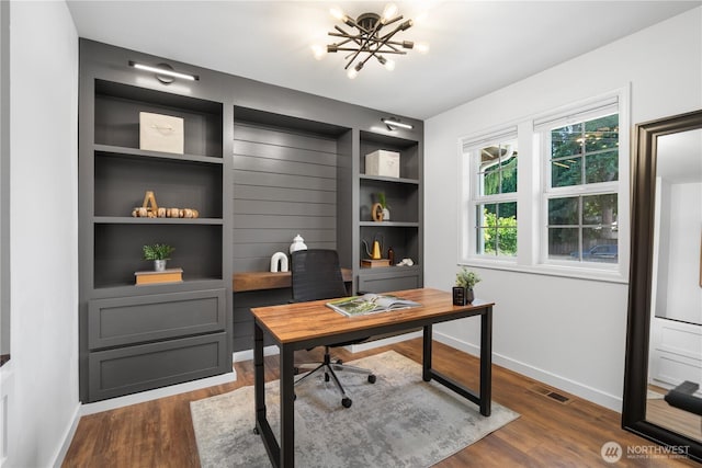 9220 NE 195th St, Bothell, WA 98011 - office area with a chandelier, dark wood finished floors, and built in shelves