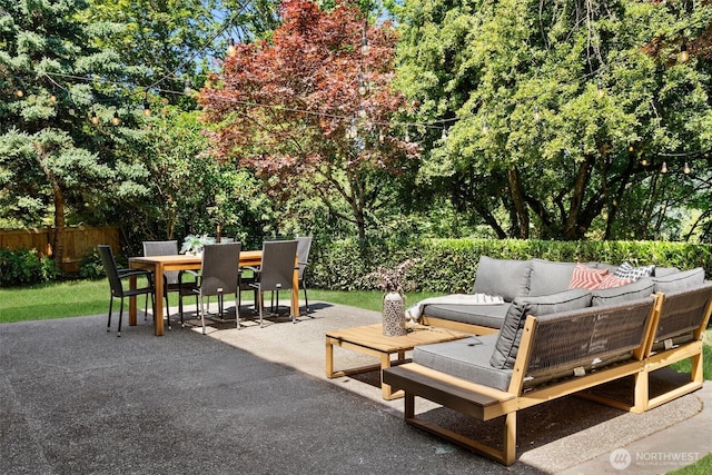 9220 NE 195th St, Bothell, WA 98011 - view of patio / terrace featuring outdoor lounge area, outdoor dining area, and view of wooded area