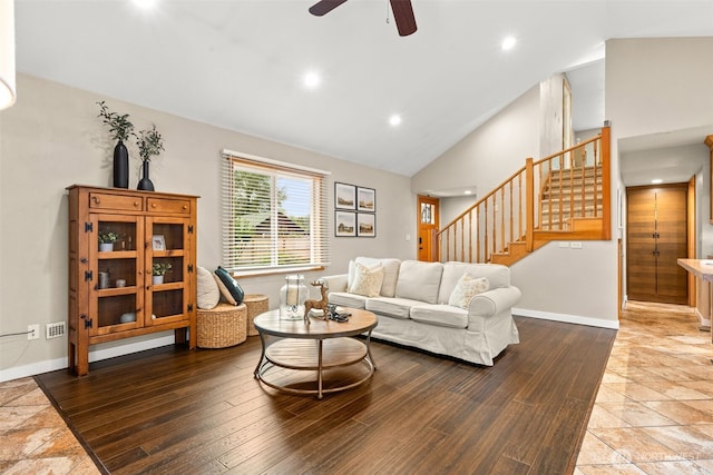 407 Leber St NE, Orting, WA 98360 - living room with ceiling fan, stairway, recessed lighting, high vaulted ceiling, and wood finished floors