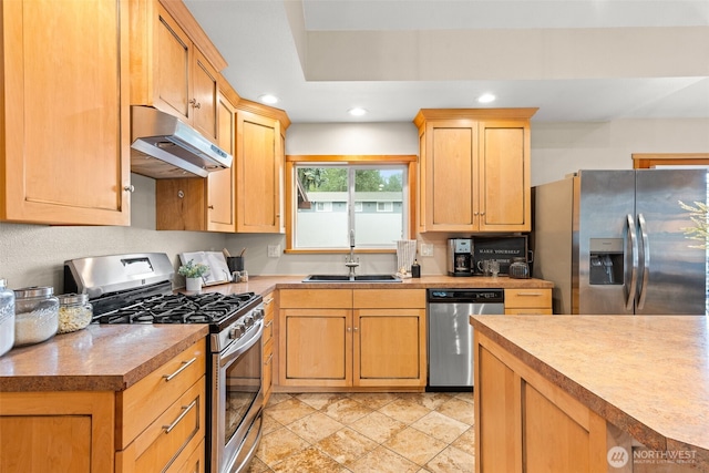 407 Leber St NE, Orting, WA 98360 - kitchen featuring stainless steel appliances, under cabinet range hood, recessed lighting, light countertops, and light brown cabinets