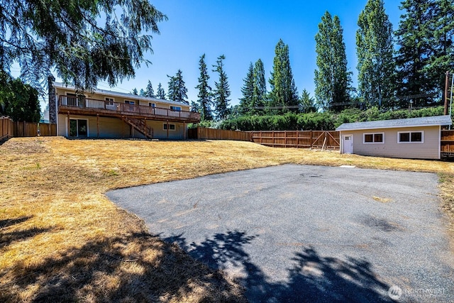 6808 NE 165th St, Kenmore, WA 98028 - fenced backyard with a deck and stairway