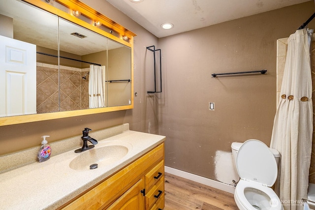 6808 NE 165th St, Kenmore, WA 98028 - bathroom with wood finished floors, vanity, and a shower with curtain