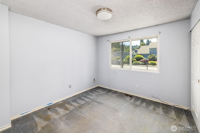 6808 NE 165th St, Kenmore, WA 98028 - unfurnished room featuring carpet flooring and a textured ceiling