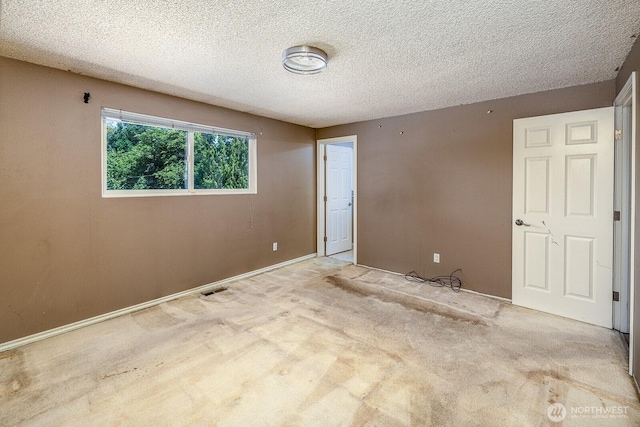 6808 NE 165th St, Kenmore, WA 98028 - unfurnished bedroom with a textured ceiling and carpet
