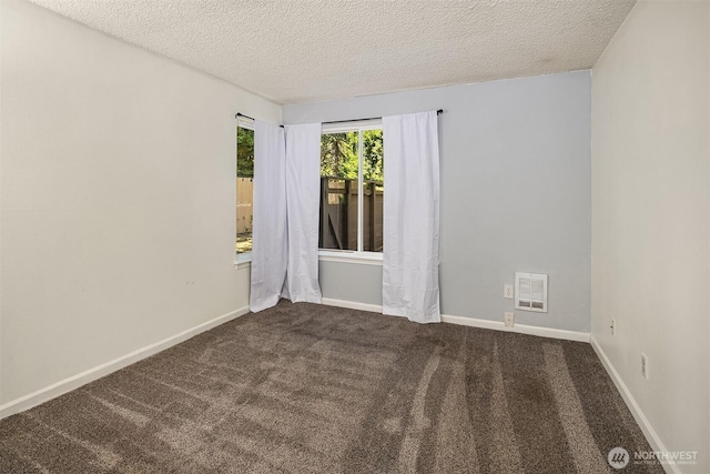 2506 S 317th St Unit 103, Federal Way, WA 98003 - carpeted empty room with a textured ceiling and baseboards