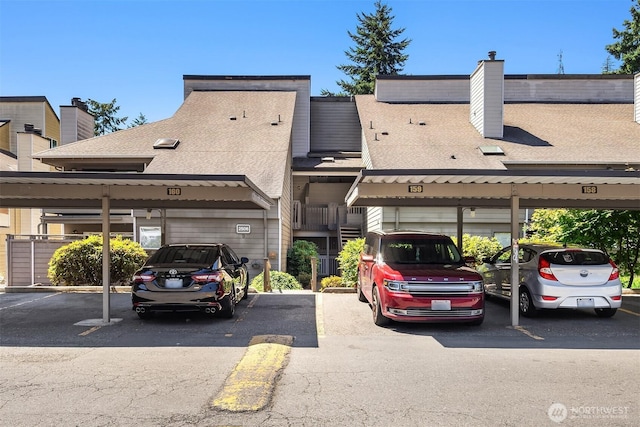 2506 S 317th St Unit 103, Federal Way, WA 98003 - view of front of home featuring covered parking