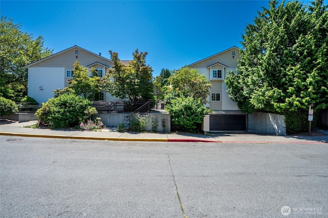 1255 NE 152nd St Unit 3, Shoreline, WA 98155 - obstructed view of property with a garage