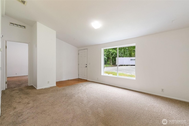 370 Van Wyck Rd, Bellingham, WA 98226 - carpeted empty room featuring vaulted ceiling and baseboards