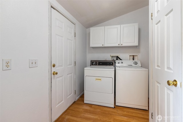 370 Van Wyck Rd, Bellingham, WA 98226 - laundry room with cabinet space, washer and dryer, and light wood-style flooring