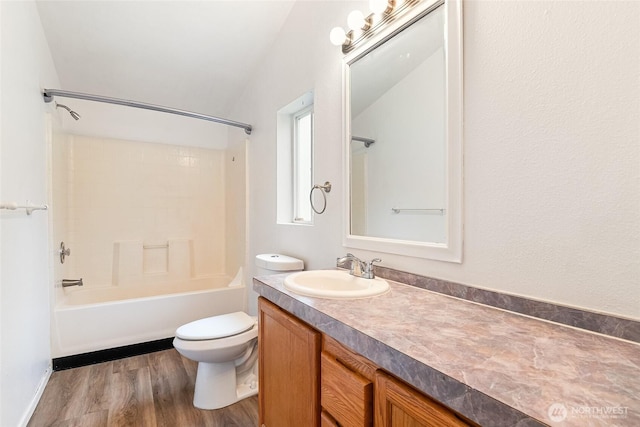 370 Van Wyck Rd, Bellingham, WA 98226 - bathroom with vanity, wood finished floors, and shower / bathtub combination
