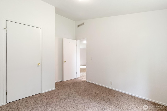 370 Van Wyck Rd, Bellingham, WA 98226 - unfurnished bedroom featuring carpet and lofted ceiling