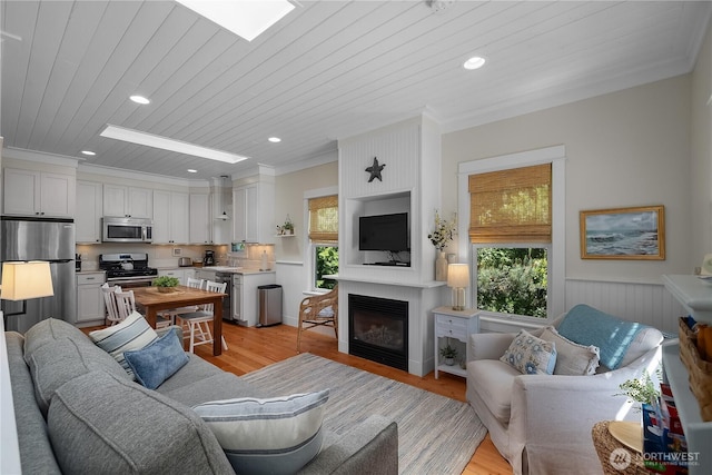 17 Beach Cabin Ln, Pacific Beach, WA 98571 - living area with healthy amount of natural light, wood ceiling, light wood-type flooring, recessed lighting, and a fireplace