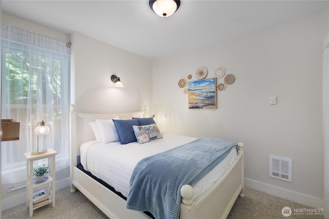 17 Beach Cabin Ln, Pacific Beach, WA 98571 - carpeted bedroom featuring baseboards and heating unit