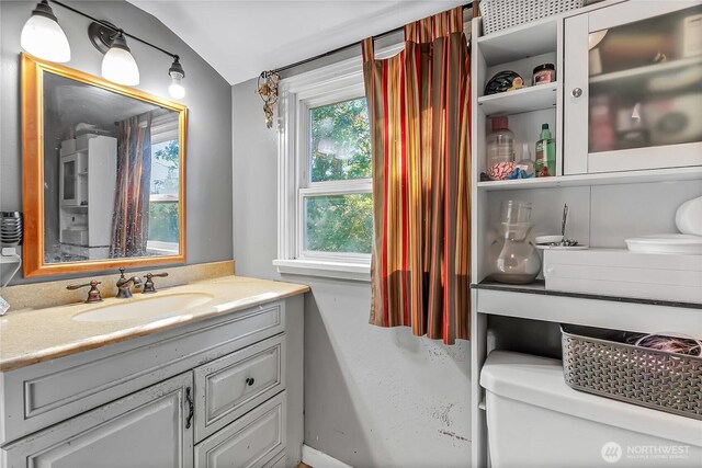 14812 SE 368th Pl, Auburn, WA 98092 - bathroom featuring vanity and vaulted ceiling