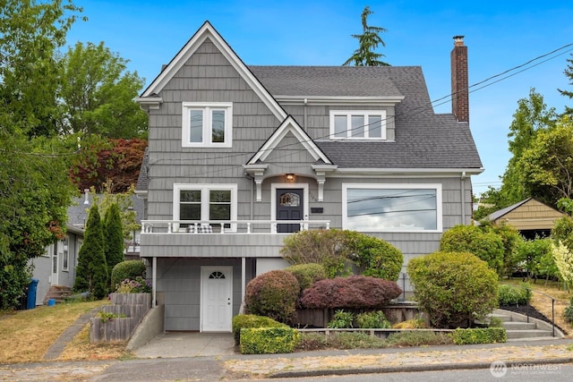 3106 NE 60th St, Seattle, WA 98115 - view of front of property featuring a chimney, roof with shingles, and a balcony