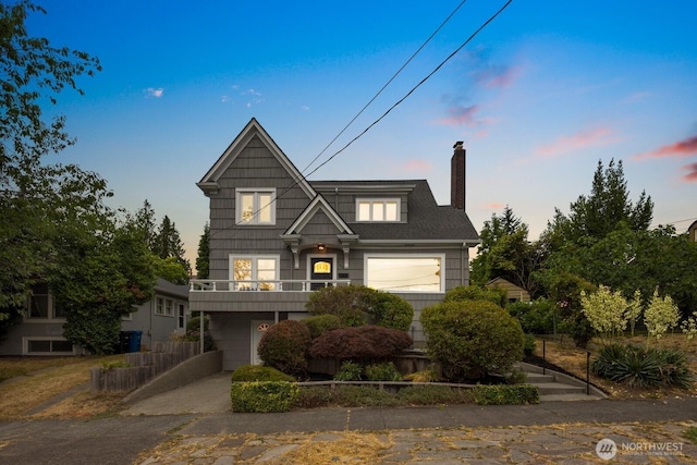 3106 NE 60th St, Seattle, WA 98115 - view of front of home with an attached garage, a chimney, and driveway