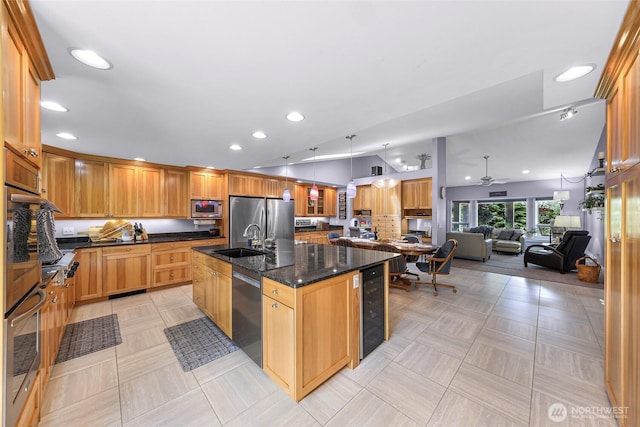 599 Loomis Trail Rd, Lynden, WA 98264 - kitchen featuring appliances with stainless steel finishes, wine cooler, ceiling fan, an island with sink, and recessed lighting