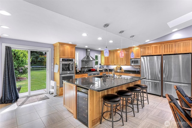 599 Loomis Trail Rd, Lynden, WA 98264 - kitchen with wine cooler, stainless steel appliances, wall chimney range hood, an island with sink, and plenty of natural light