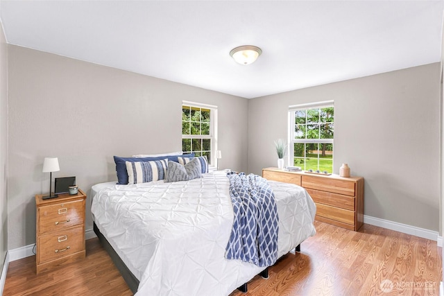 599 Loomis Trail Rd, Lynden, WA 98264 - bedroom with wood finished floors and baseboards