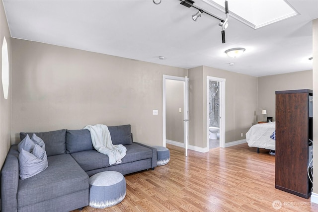 599 Loomis Trail Rd, Lynden, WA 98264 - living room featuring light wood-type flooring and rail lighting