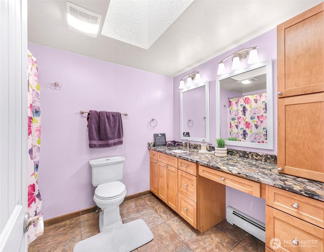 599 Loomis Trail Rd, Lynden, WA 98264 - full bathroom with a baseboard radiator, vanity, and curtained shower