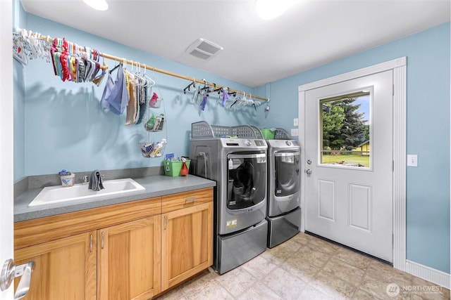599 Loomis Trail Rd, Lynden, WA 98264 - washroom with separate washer and dryer and cabinet space