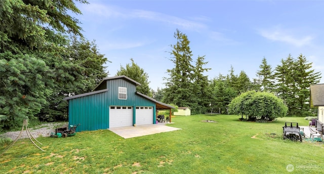 599 Loomis Trail Rd, Lynden, WA 98264 - view of grassy yard featuring an outdoor structure, a garage, and a barn