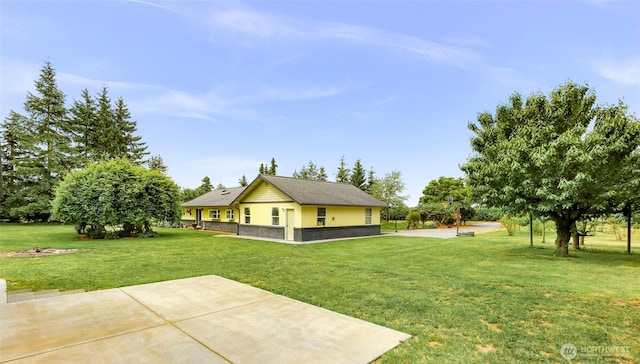 599 Loomis Trail Rd, Lynden, WA 98264 - view of green lawn with a patio