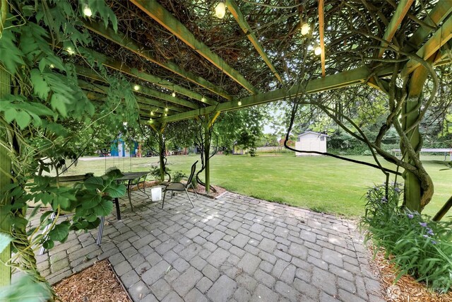 599 Loomis Trail Rd, Lynden, WA 98264 - view of patio / terrace featuring a storage unit