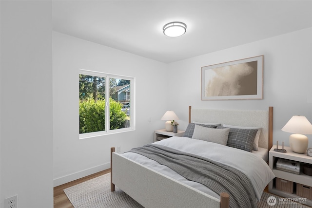 13511 SE 266th St, Kent, WA 98042 - bedroom featuring wood finished floors and baseboards