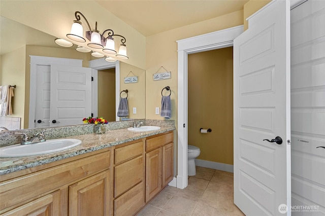 218 Lilly Ln, Mount Vernon, WA 98274 - bathroom featuring double vanity and tile patterned floors