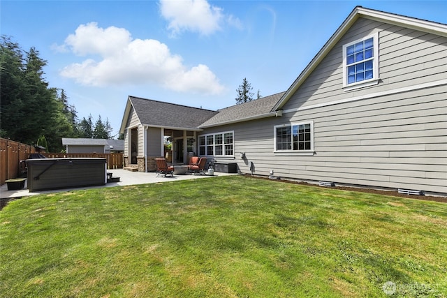 218 Lilly Ln, Mount Vernon, WA 98274 - rear view of house with a patio and a hot tub