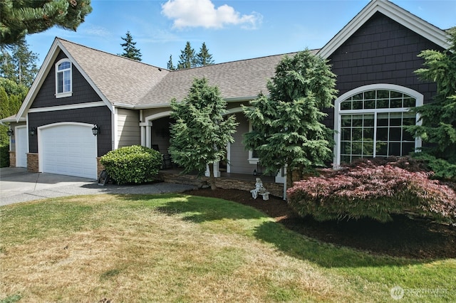 218 Lilly Ln, Mount Vernon, WA 98274 - view of front of house with driveway, a shingled roof, and a front yard