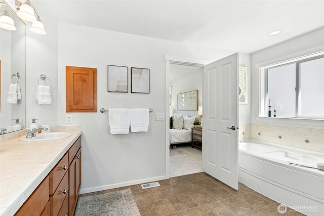 3419 NE Meadow Way, Issaquah, WA 98029 - bathroom with ensuite bath, vanity, and a garden tub