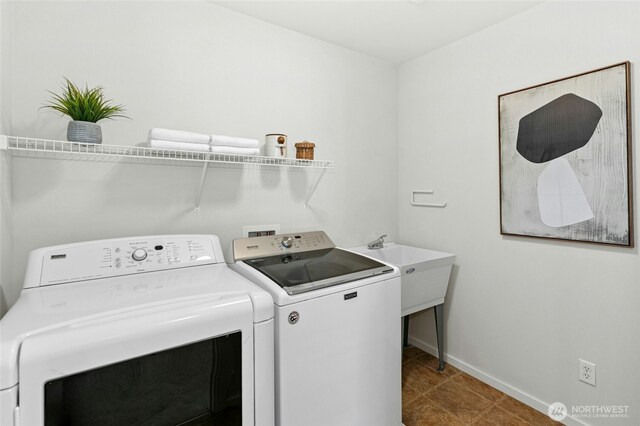 3419 NE Meadow Way, Issaquah, WA 98029 - laundry area featuring separate washer and dryer and tile patterned flooring