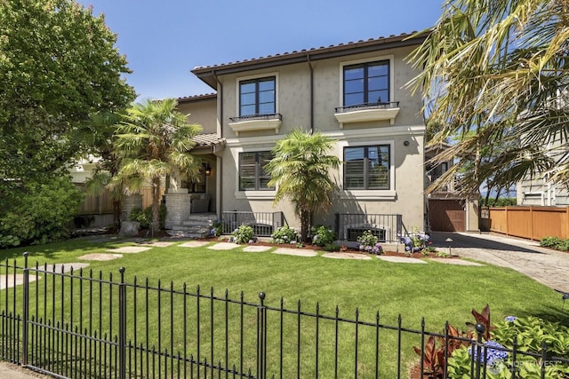 4043 55th Ave SW, Seattle, WA 98116 - mediterranean / spanish-style home featuring stucco siding, driveway, and a tiled roof