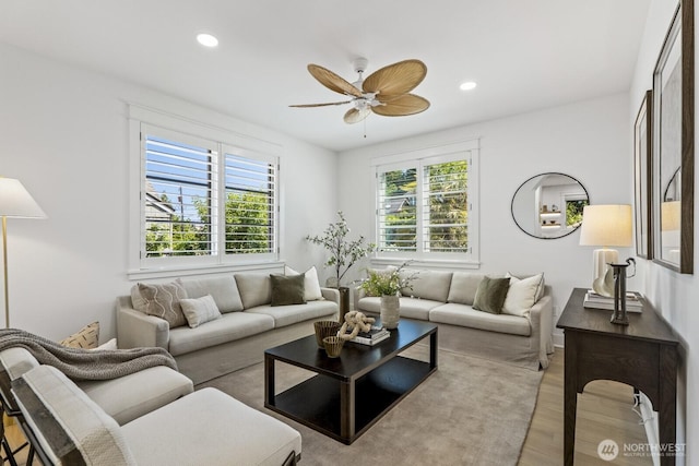 4043 55th Ave SW, Seattle, WA 98116 - living room with plenty of natural light, a ceiling fan, light wood finished floors, and recessed lighting