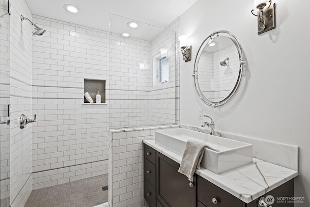 4043 55th Ave SW, Seattle, WA 98116 - bathroom with tiled shower, vanity, and recessed lighting