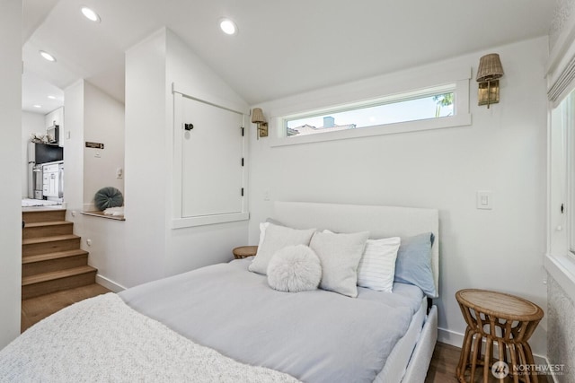 4043 55th Ave SW, Seattle, WA 98116 - bedroom with recessed lighting, wood finished floors, and lofted ceiling
