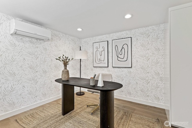 4043 55th Ave SW, Seattle, WA 98116 - office featuring wallpapered walls, an AC wall unit, wood finished floors, and recessed lighting