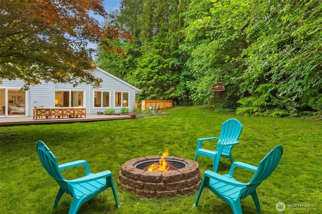 12407 Upper Preston Rd SE, Issaquah, WA 98027 - view of yard featuring an outdoor fire pit and a deck