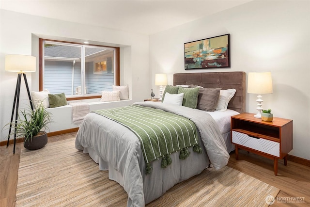12407 Upper Preston Rd SE, Issaquah, WA 98027 - bedroom featuring wood finished floors and baseboards